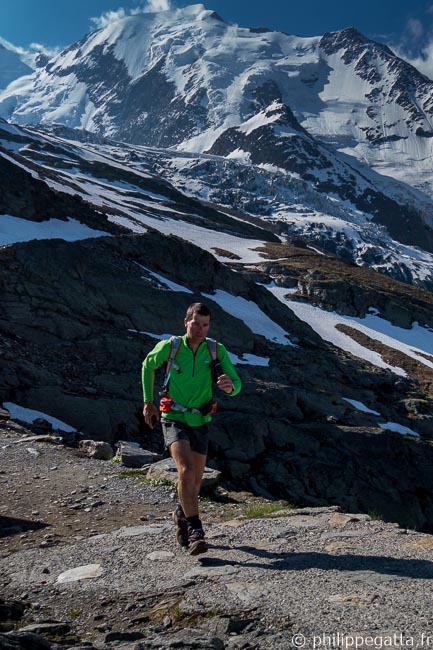 Philippe at Nid d'Aigle, Aiguille de Bionnassay behind (© A. Gatta)
